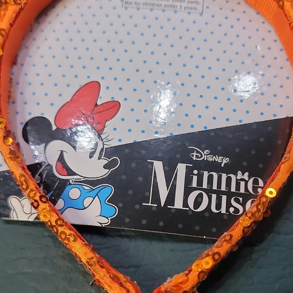 **Disney Sparkling Orange Minnie Ears with Black Bow**